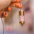 rose quartz, rose quartz crystal, rose quartz pendulum, pendulum, crystal pendulum, intuition