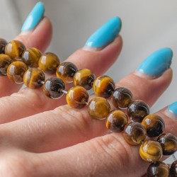 tigrovo oko, tigrovo oko kristal, tigrovo oko perle, perle iz kristalov, kristali za ustvarjanje, kristali za moč