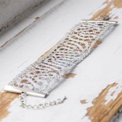 Lace bracelet. A unique fashion accessory in silver color.