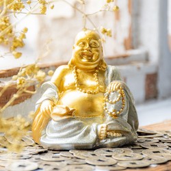 Gold-silver laughing Buddha statuette on Chinese coins, feng shui decor